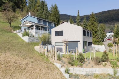 helles Holzhaus mit Garten - Holzbau - Holzhaus - Holzsystembau - PM Mangold